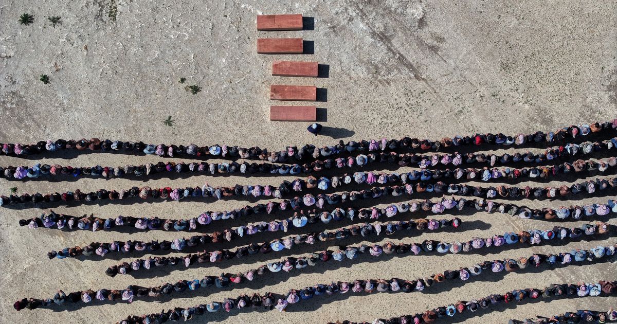 Syrian father buries wife and four children killed in Israeli strikes on Beirut as daughter remains missing