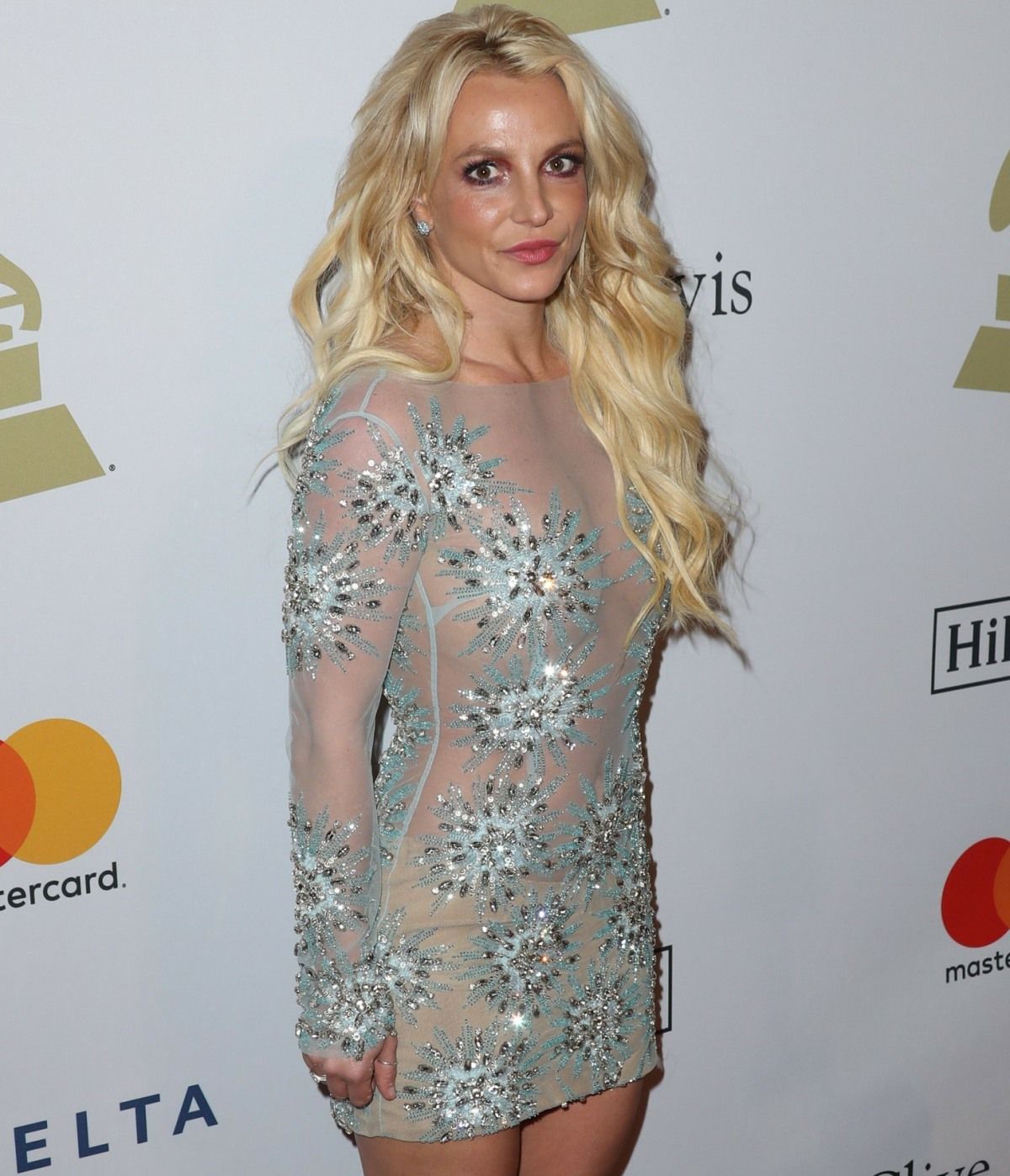 Britney Spears' representatives deny knife allegations after chaotic restaurant outing reports emerge.