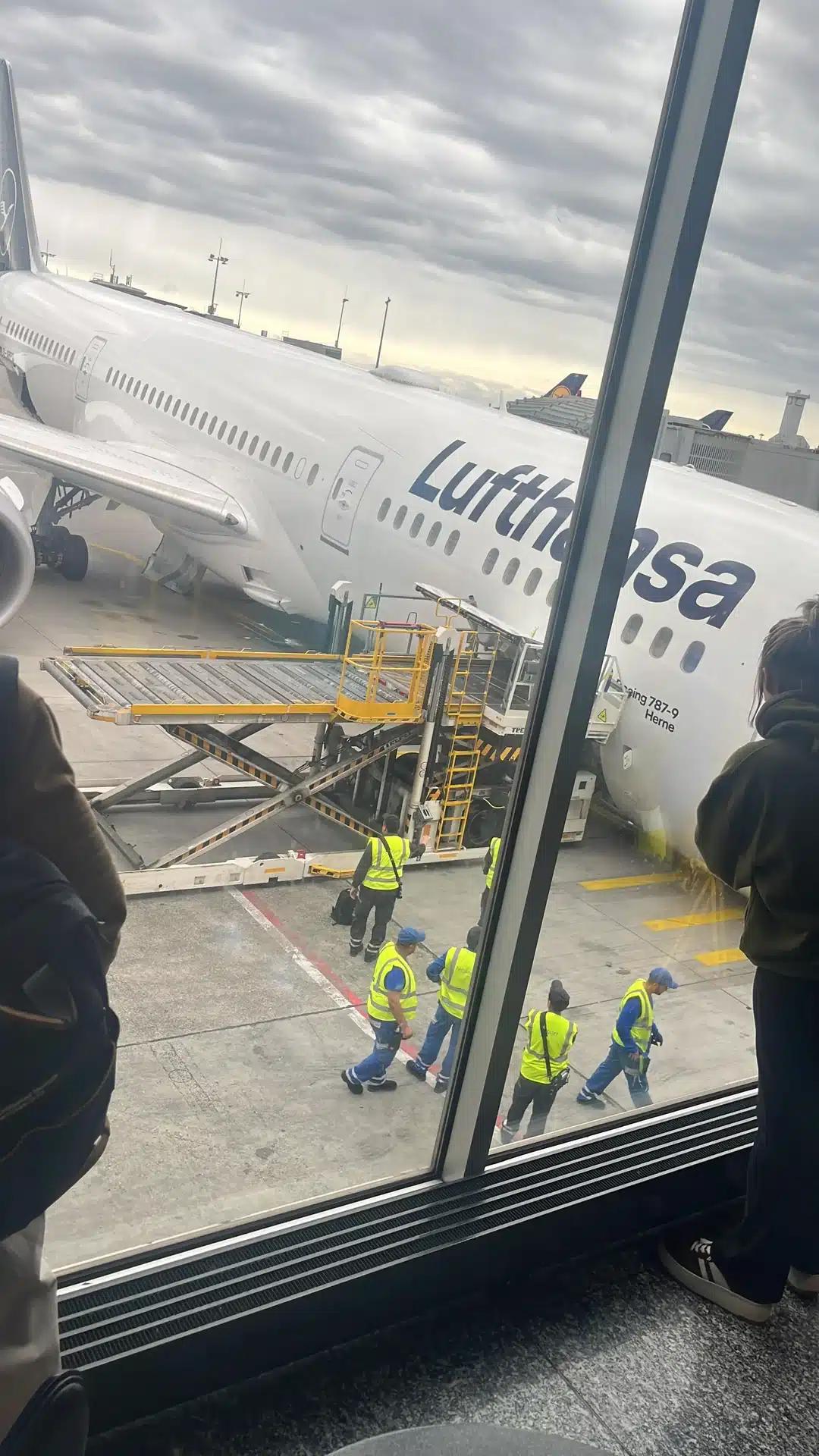 Lufthansa Boeing 787 nose gear collapses at Frankfurt gate, injuring multiple staff.
