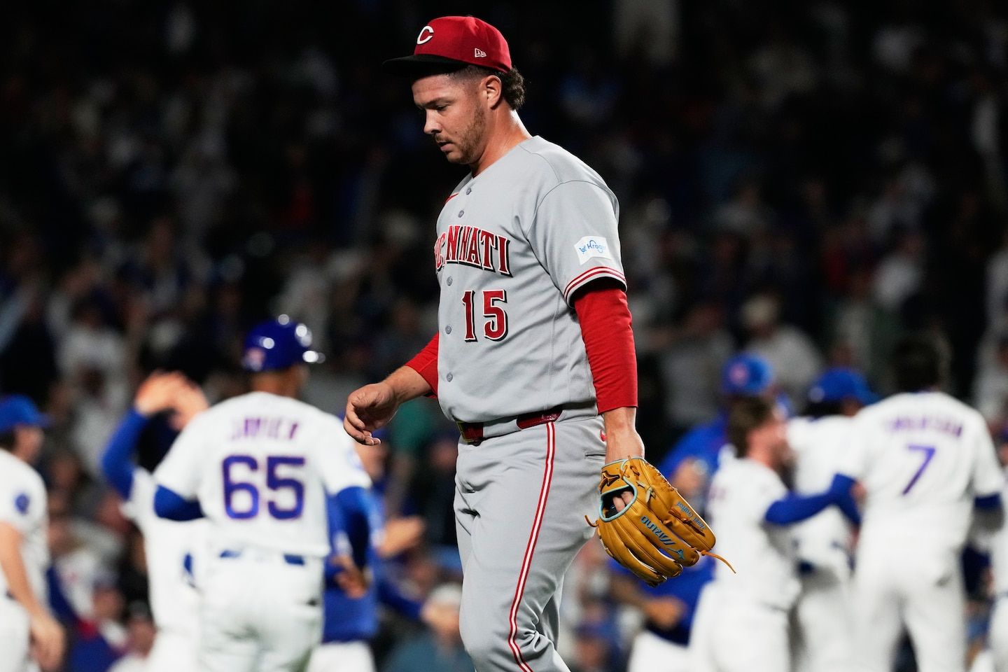 Cincinnati Reds closer Emilio Pagán leaves game with apparent left hamstring injury against Cubs