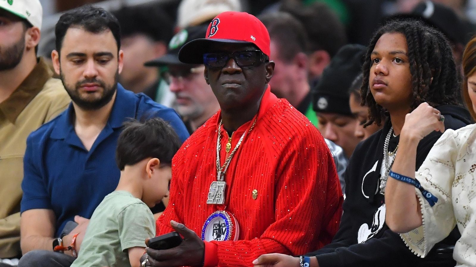 Flavor Flav visits both Fenway Park and TD Garden in one day, catching Red Sox and Celtics games