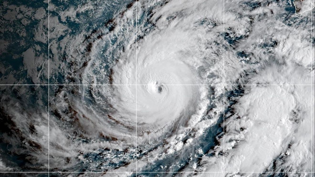 Hawaii braces for heavy rain and floods as Hurricane Lowell approaches islands