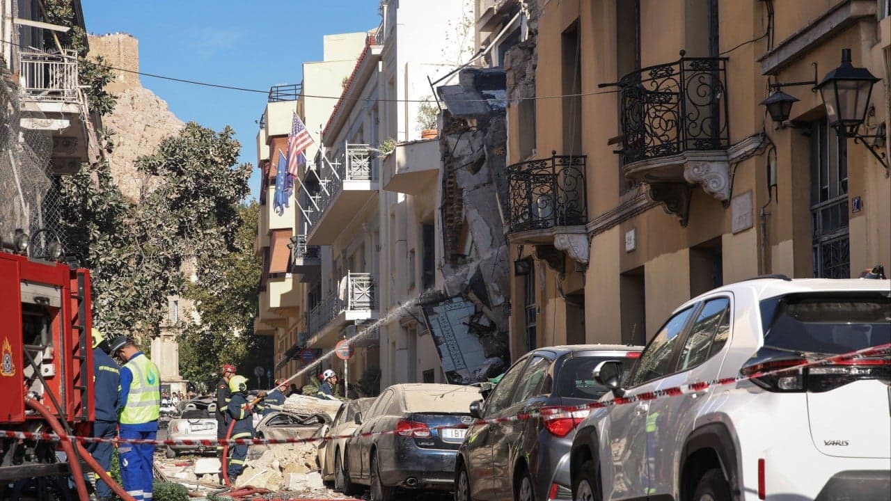 An explosion in a historic Athens neighborhood collapses a building, injuring multiple people.